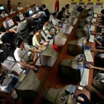 Philippine internet café setup showing computer monitors in a row representing 2000s cybercafé gaming culture